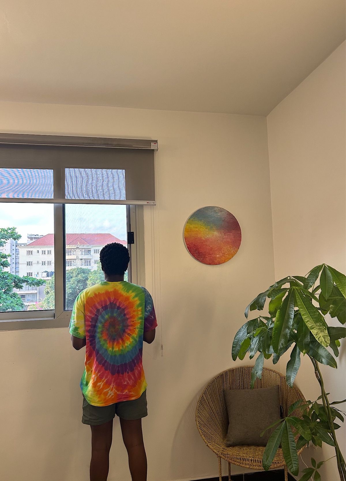 Picture of Tomiwa in a tie and dye taken by Mofope